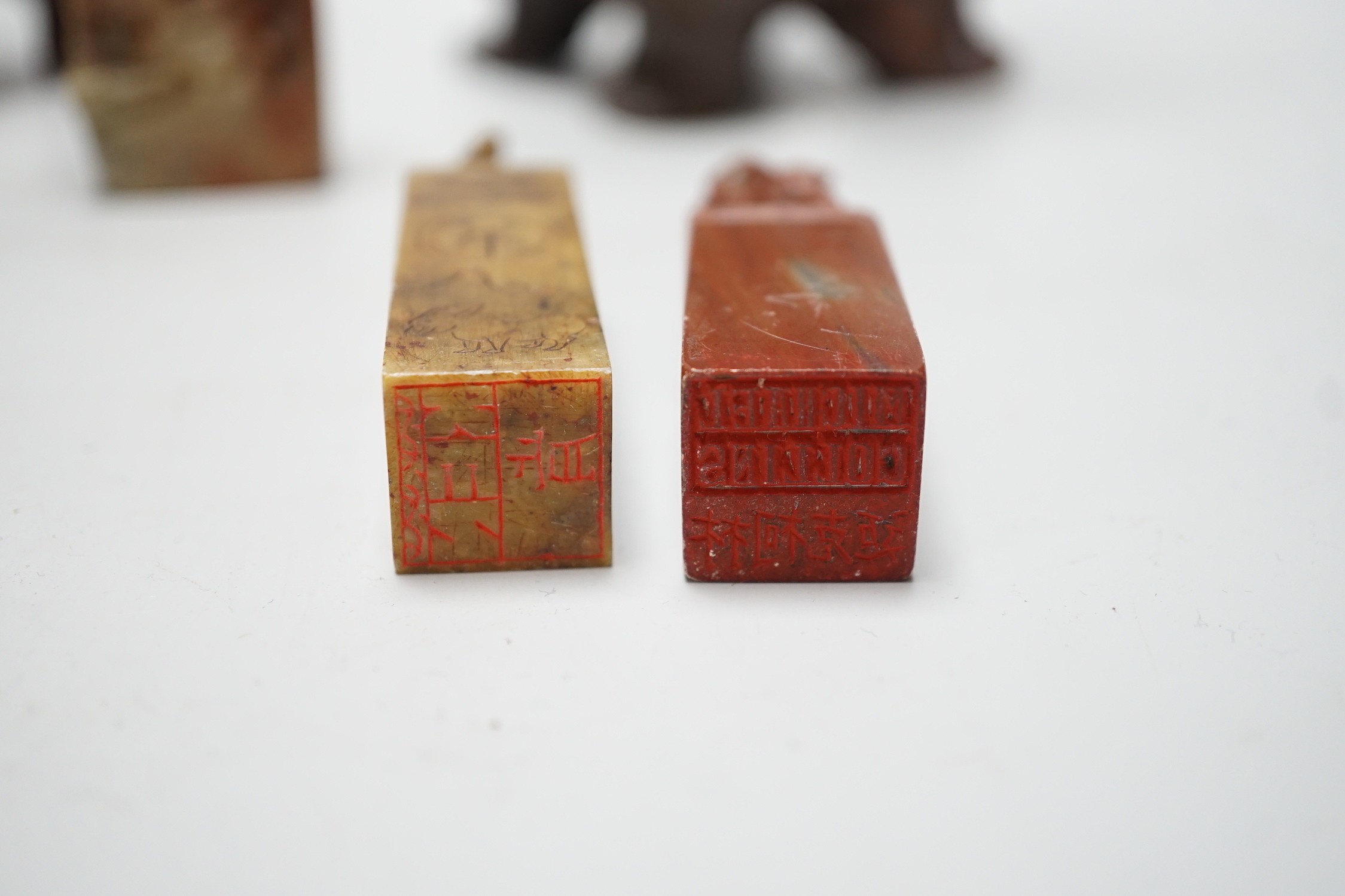 A group of Chinese soapstone carvings and seals, tallest 20cm